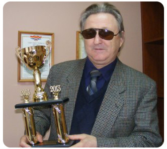Анатолий Башкин второй год подряд берет кубок международного турнира по 100-клеточным шашкам.